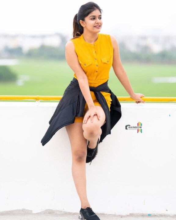Sanjana Anand in sleeveless mustard jumpsuit shorts
