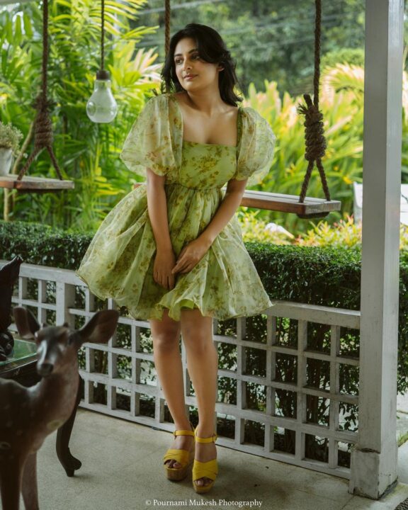 Esther Anil hot photos in green floral short frock