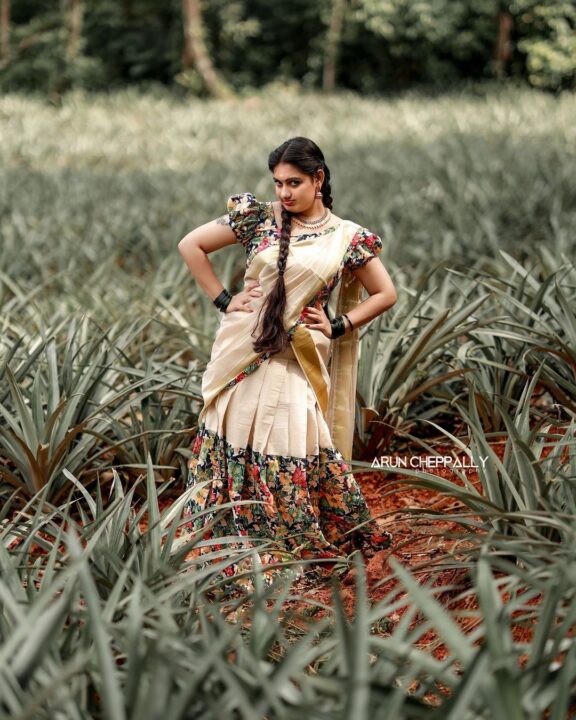 Manve Surendran in traditional half saree photos