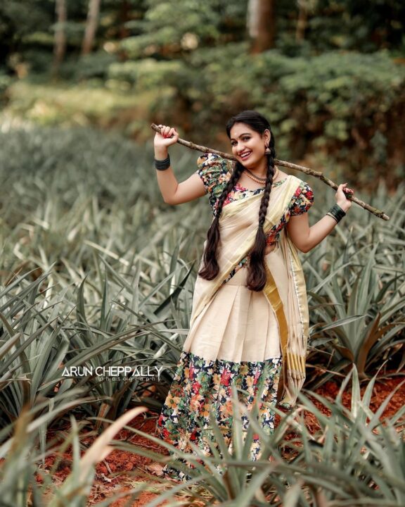 Manve Surendran in traditional half saree photos