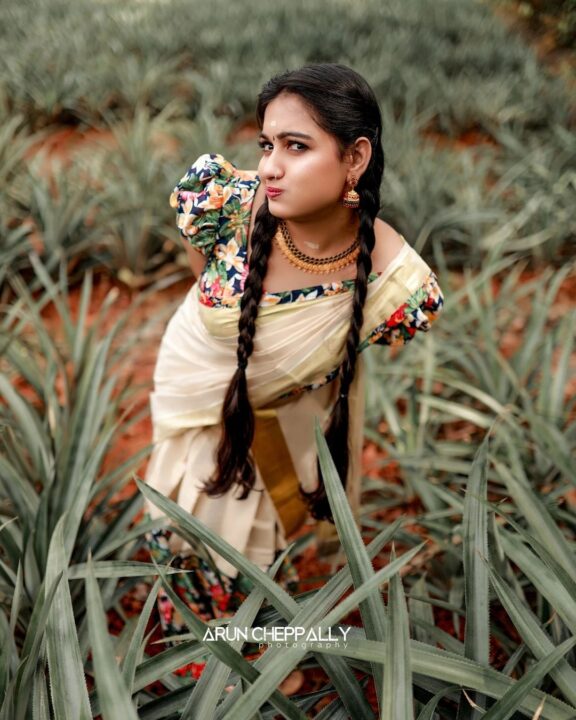 Manve Surendran in traditional half saree photos