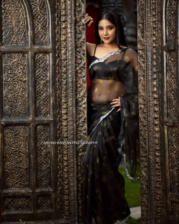 Sakshi Agarwal hot navel stills in black organza saree