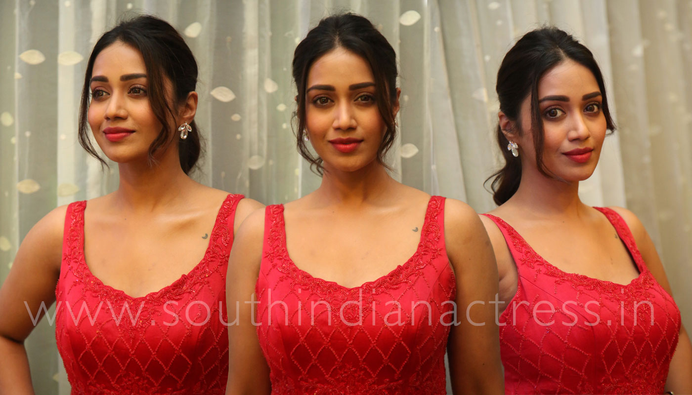 Nivetha Pethuraj in red dress at Paagal Movie Pre-Release Event