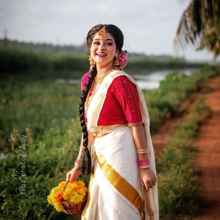 Saniya Babu beautiful stills in Kerala Kasavu Saree