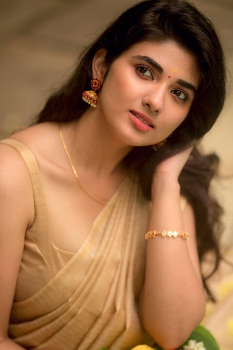 Pragya Nagra in golden saree photos