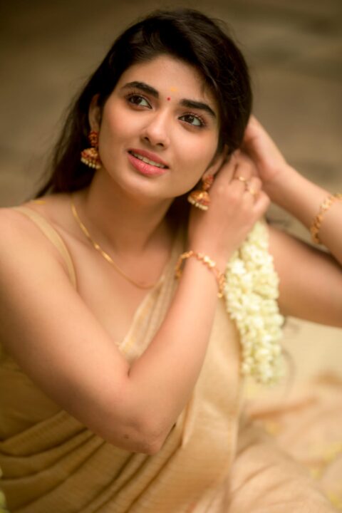 Pragya Nagra in golden saree photos