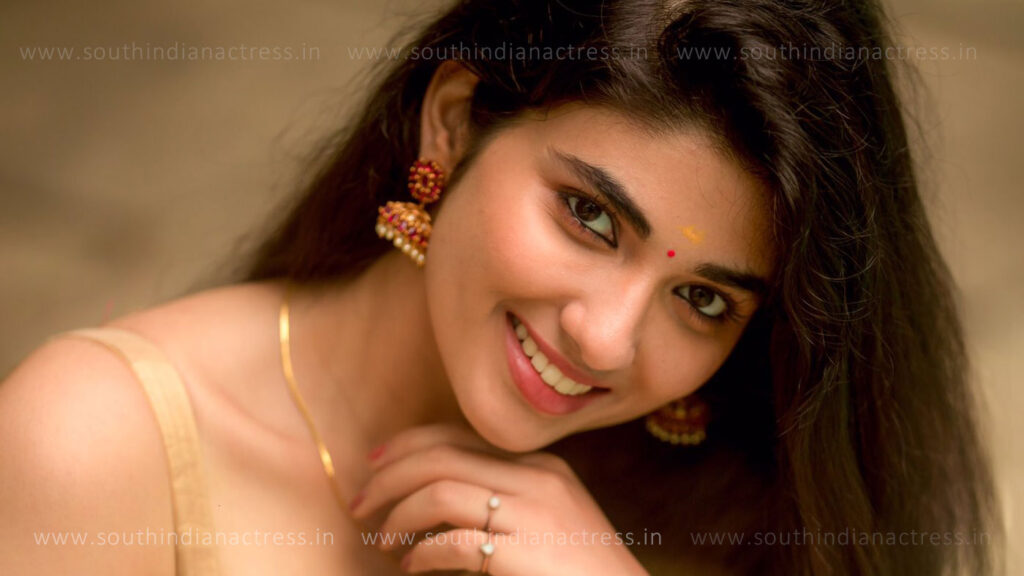 Pragya Nagra in golden saree photos