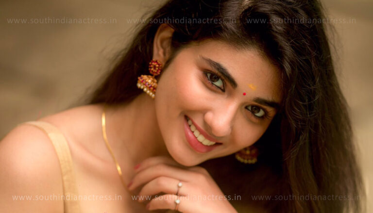 Pragya Nagra in golden saree photos
