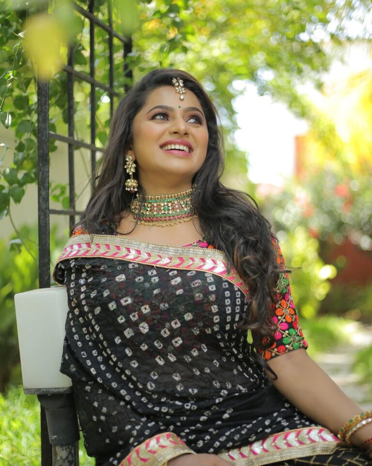 Delna Davis in black half saree photos - South Indian Actress