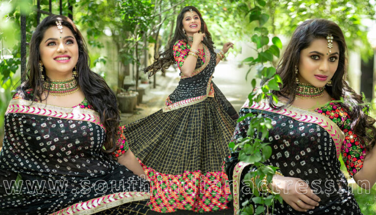 Delna Davis in black half saree photos