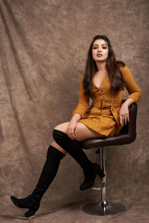 Catherine Tresa wearing Long Sleeve Plunge Buttoned Bodycon Dress