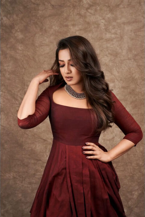 Catherine Tresa in maroon gown dress