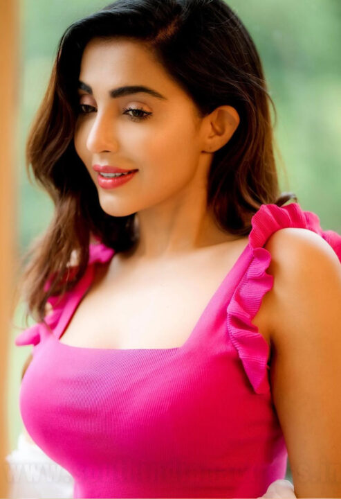 Parvati Nair in pink top photoshoot stills