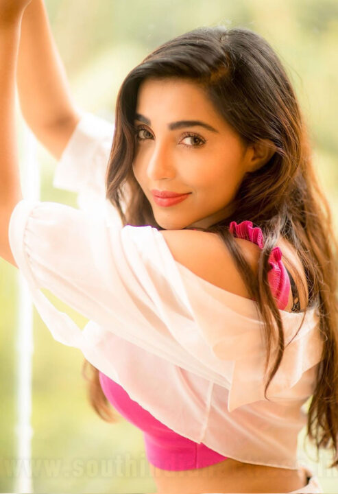 Parvati Nair in pink top photoshoot stills