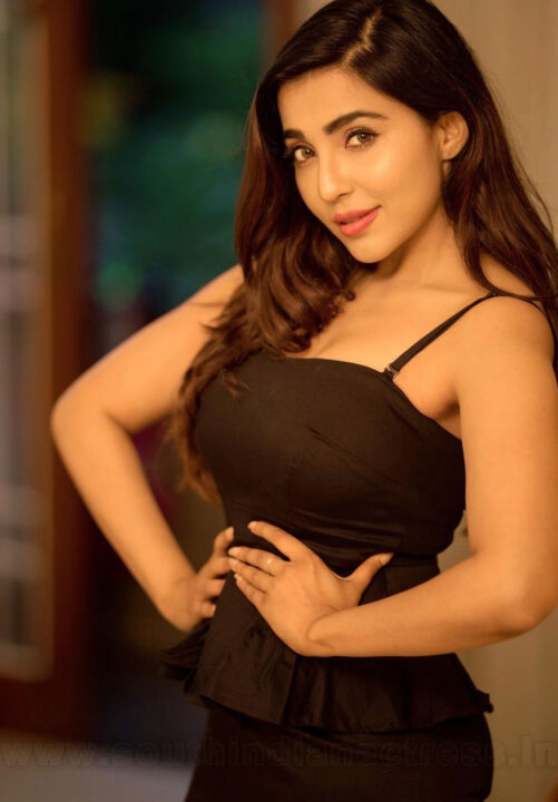 Parvati Nair in black dress photoshoot stills