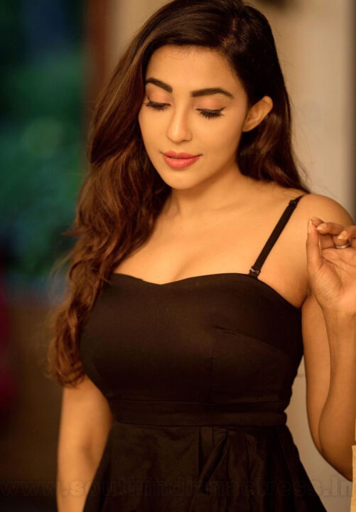 Parvati Nair in black dress photoshoot stills