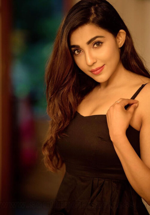 Parvati Nair in black dress photoshoot stills