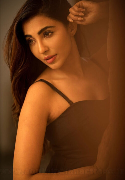 Parvati Nair in black dress photoshoot stills