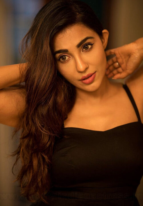 Parvati Nair in black dress photoshoot stills