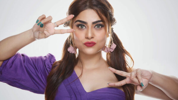 Priyanka Sharma in purple dress