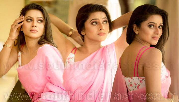 Delna Davis in pink saree photos