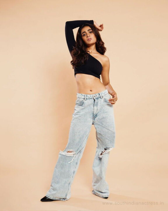 Shalini Pandey in black One Shoulder Fitted Crop Top with ripped jeans