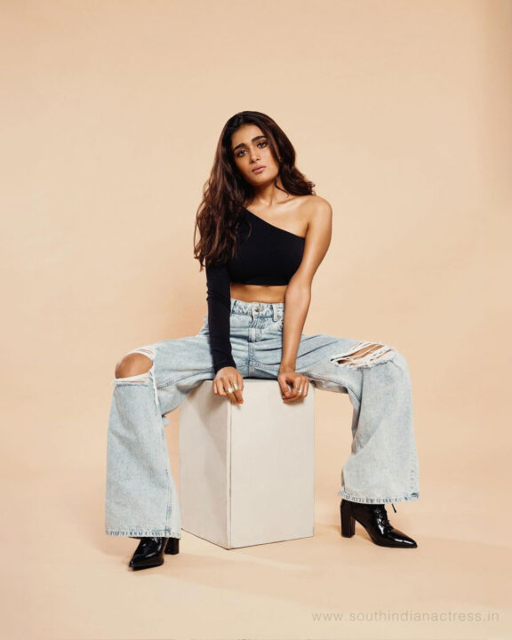 Shalini Pandey in black One Shoulder Fitted Crop Top with ripped jeans