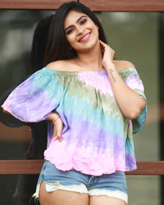 Spoorthi Gowda in off shoulder and jeans shorts