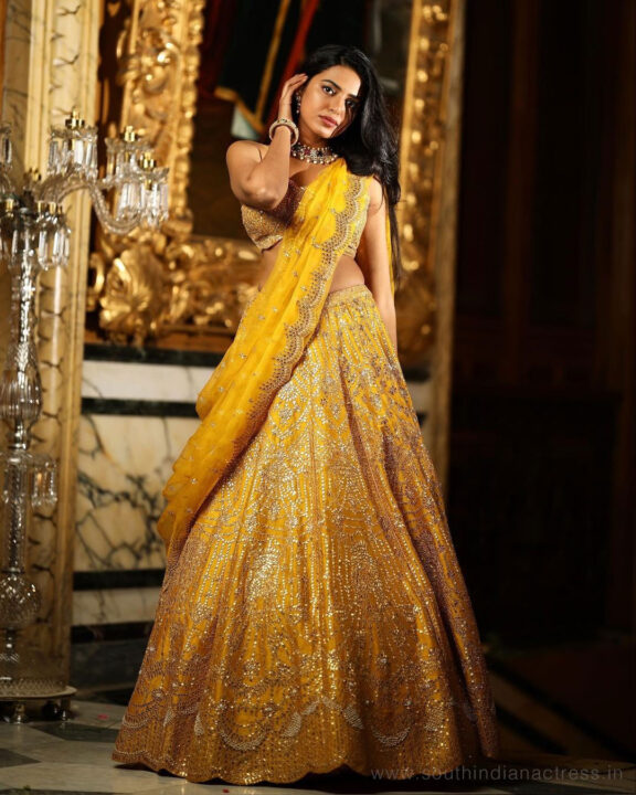 Shivani Rajashekar in yellow bridal lehenga