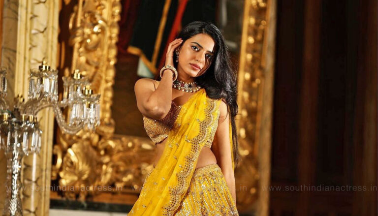 Shivani Rajashekar in yellow bridal lehenga