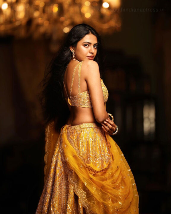 Shivani Rajashekar in yellow bridal lehenga