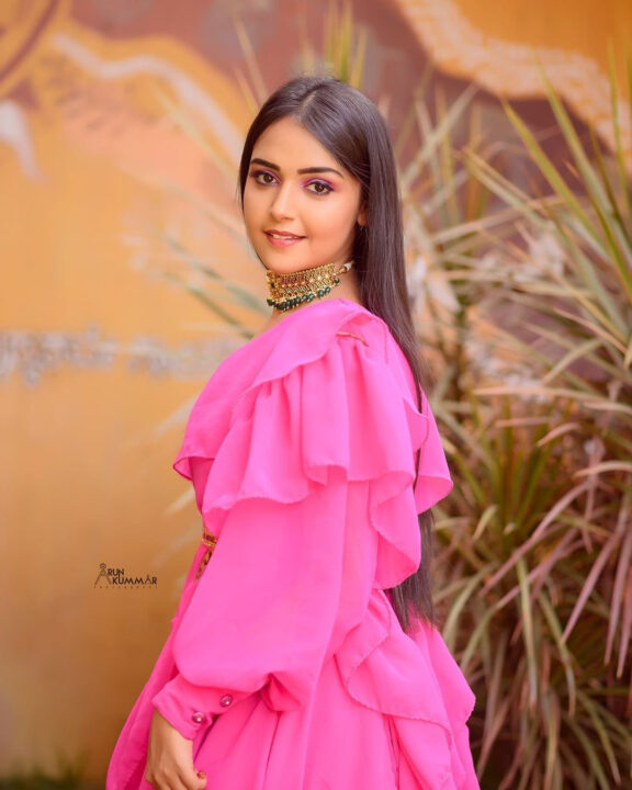 Nisha Ravikrishnan in pink dress photoshoot stills