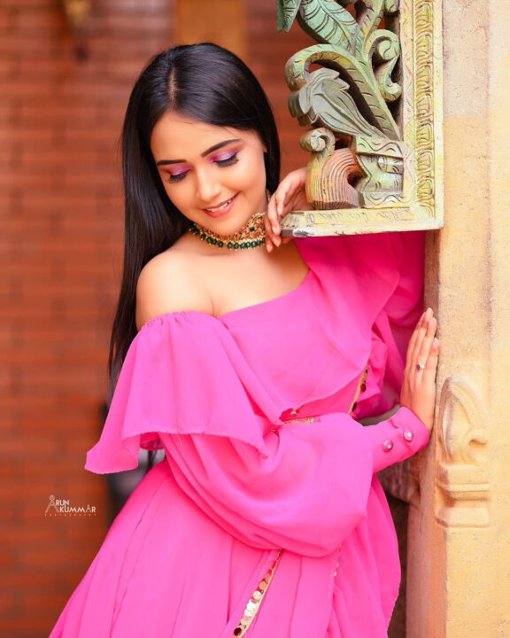 Nisha Ravikrishnan in pink dress photoshoot stills