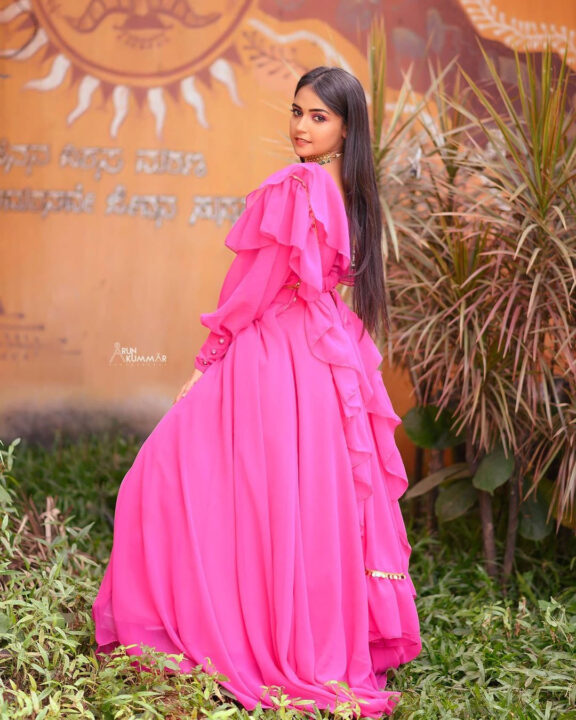 Nisha Ravikrishnan in pink dress photoshoot stills