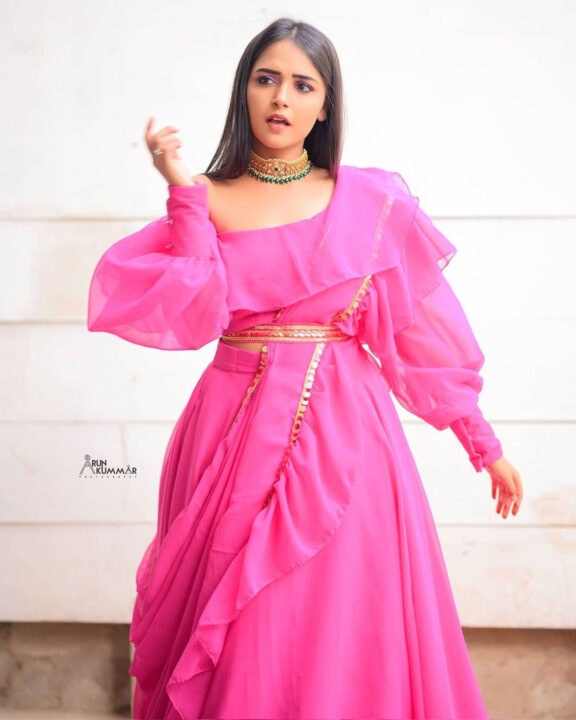 Nisha Ravikrishnan in pink dress photoshoot stills