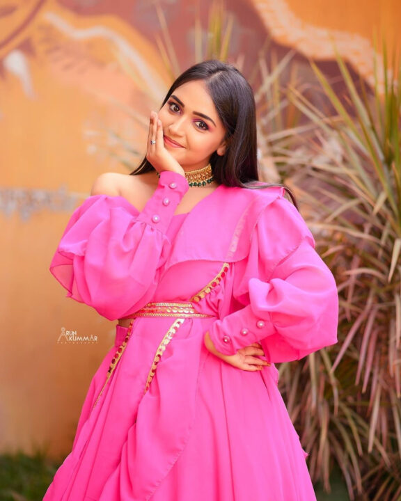 Nisha Ravikrishnan in pink dress photoshoot stills