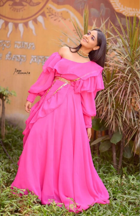 Nisha Ravikrishnan in pink dress photoshoot stills