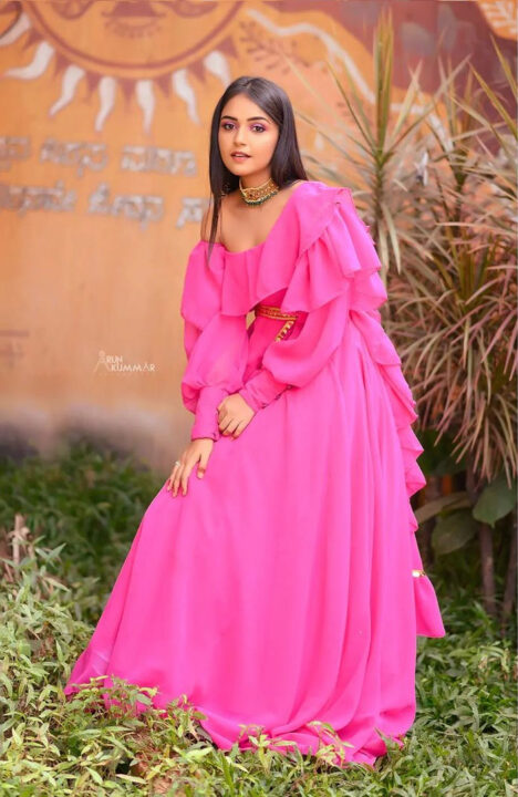 Nisha Ravikrishnan in pink dress photoshoot stills