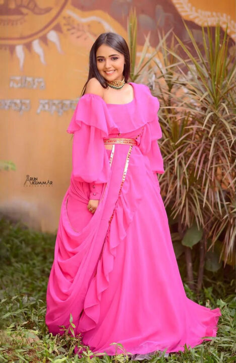 Nisha Ravikrishnan in pink dress photoshoot stills