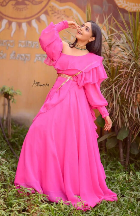 Nisha Ravikrishnan in pink dress photoshoot stills