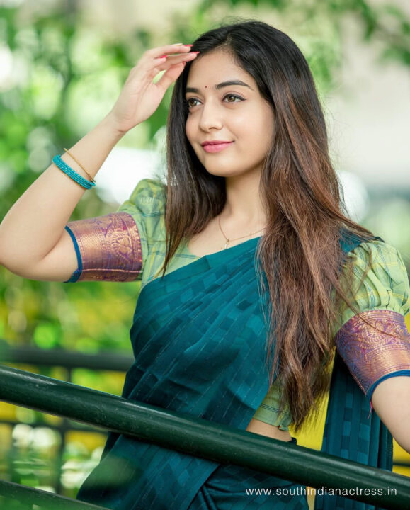 Athmika Sumithran in sea green and blue half saree