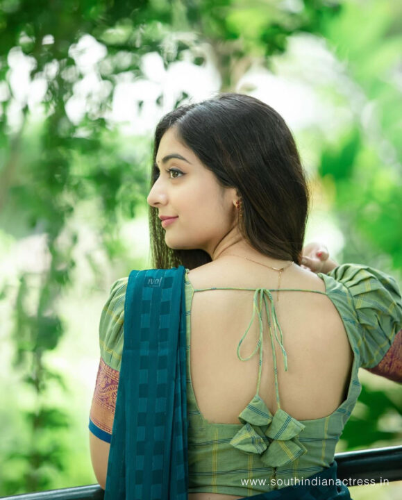 Athmika Sumithran in sea green and blue half saree