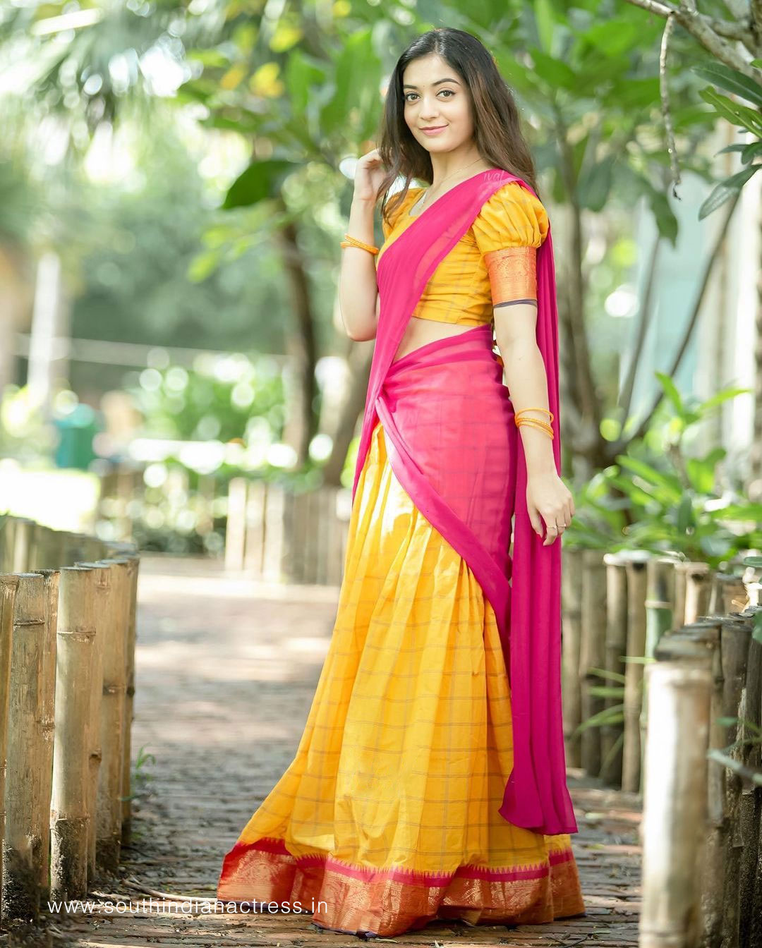 Athmika Sumithran in yellow and pink half saree - South Indian Actress