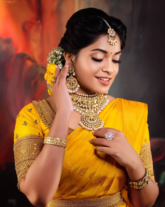 Jashnavi Venkat in yellow bridal silk saree
