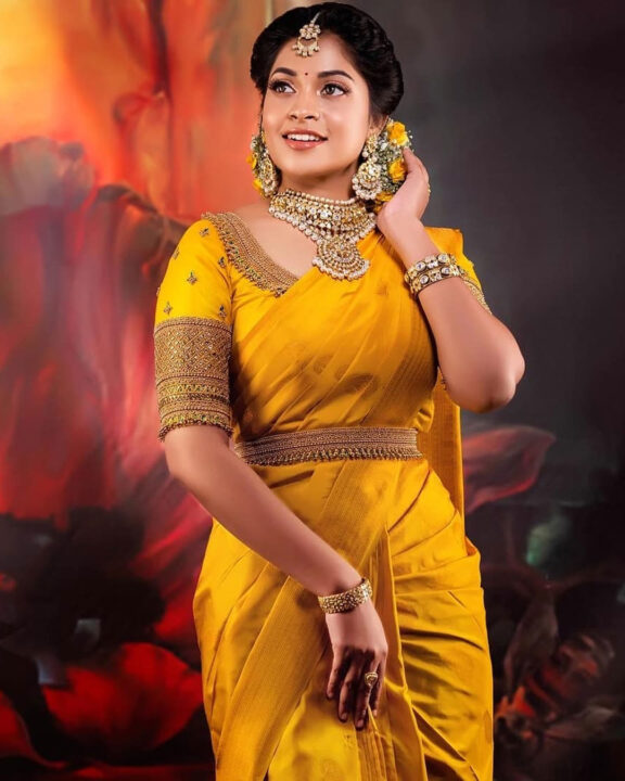 Jashnavi Venkat in yellow bridal silk saree
