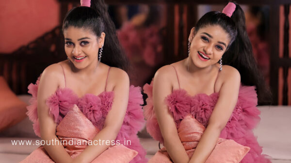 Saniya Babu beautiful stills in pink outfit