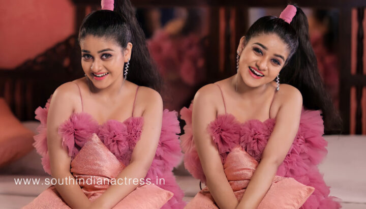 Saniya Babu beautiful stills in pink outfit