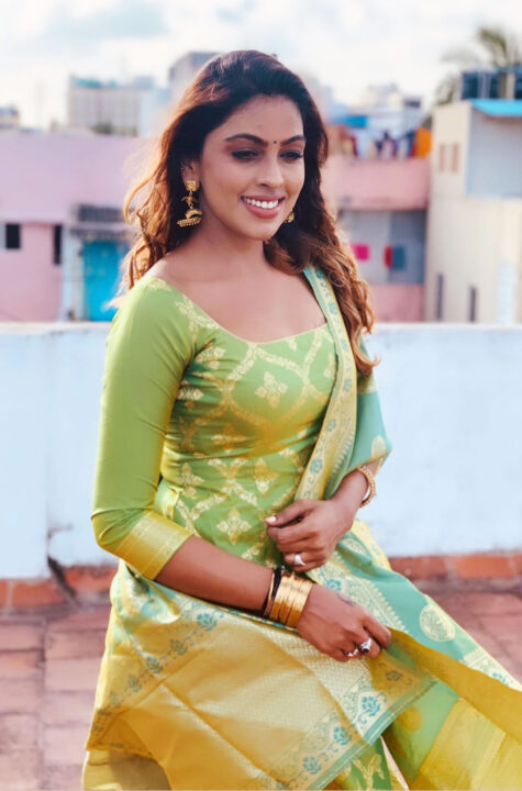 Sri Nikha hot stills in green salwar
