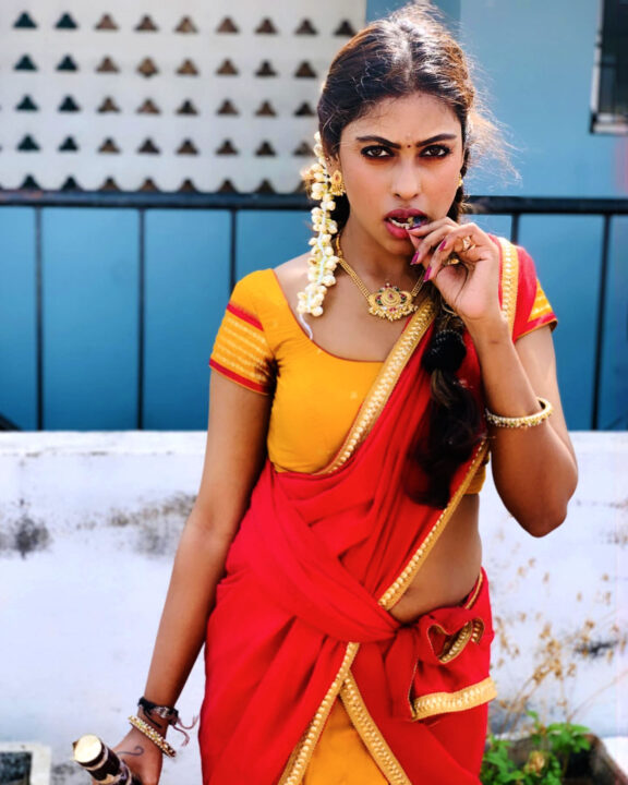 Sri Nikha hot stills in half saree