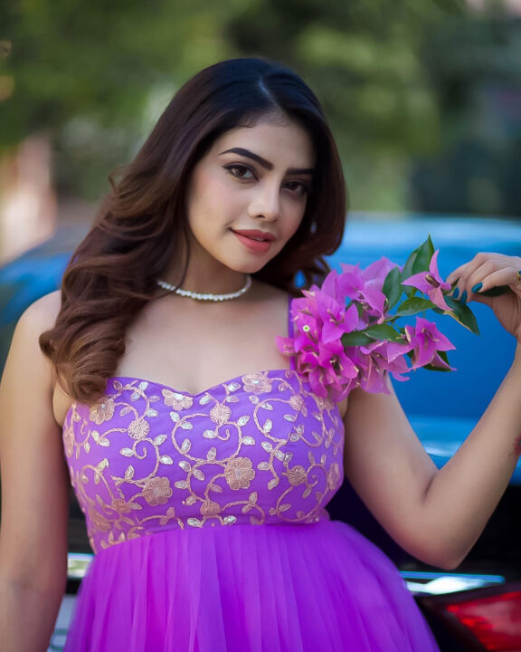 Susmitha Anala stills in purple party wear outfit